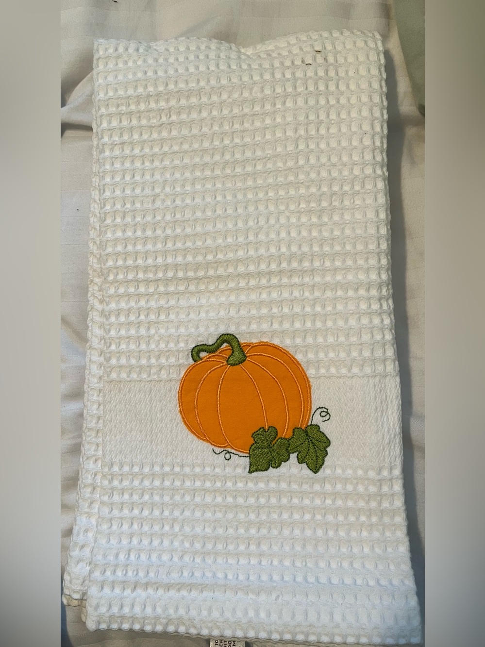 Wilson White Waffle Weave Towel with Orange Pumpkin Embroidery